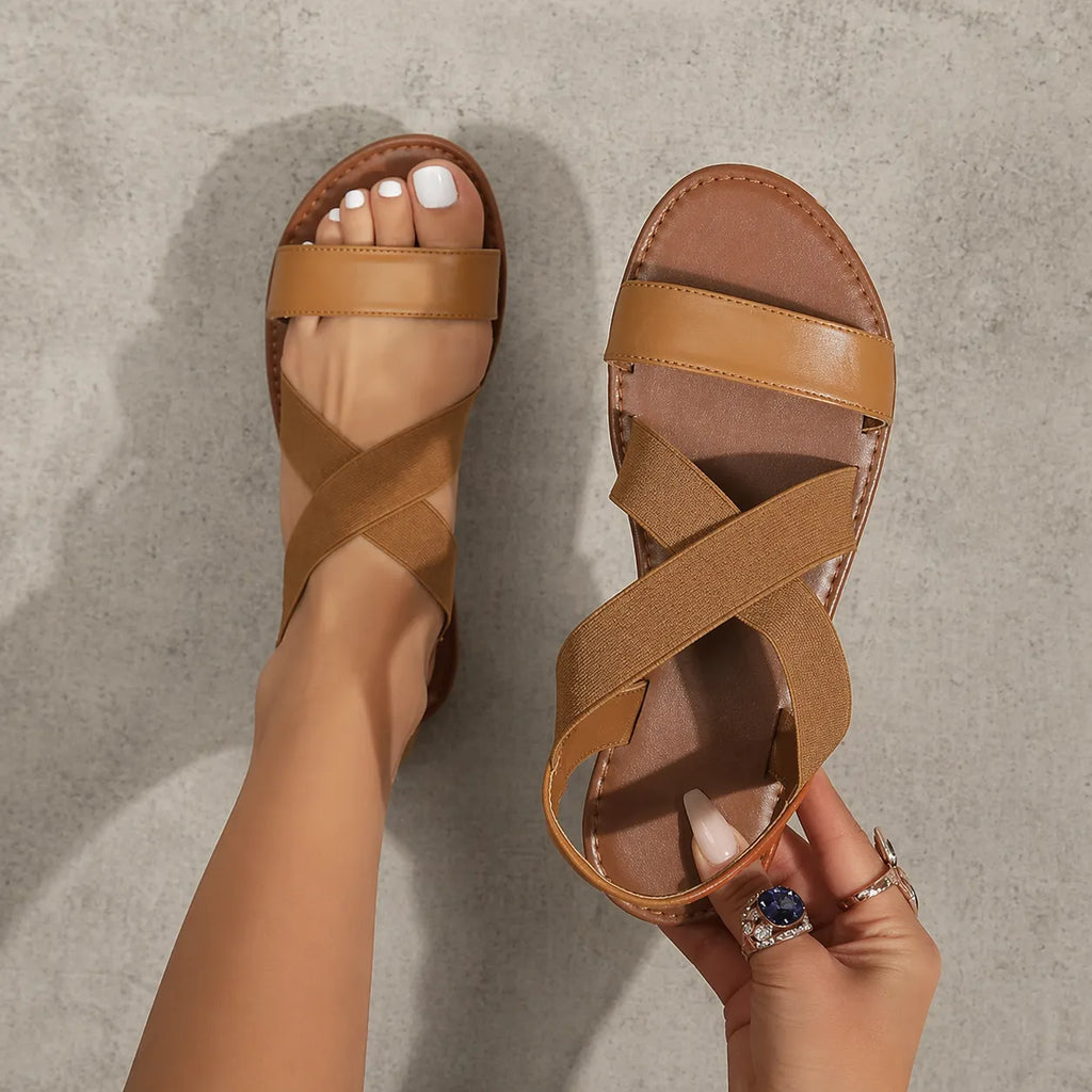 Sandale plate noire femme Eline | Élastiques croisés